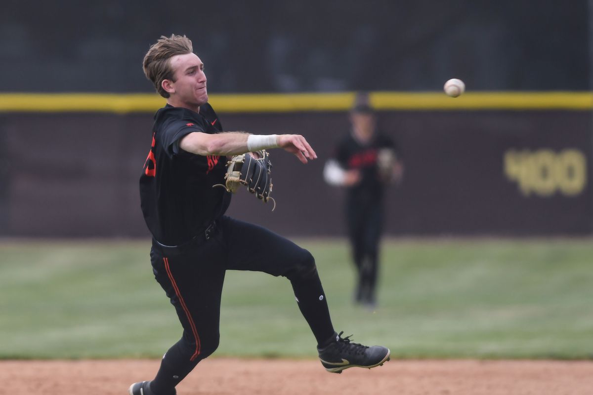 Huntington Beach Jason Dunham (56) makes a throw to first during an High School Baseball game against   Temecula Valley Tuesday May 12, 2026 in Temecula, California.