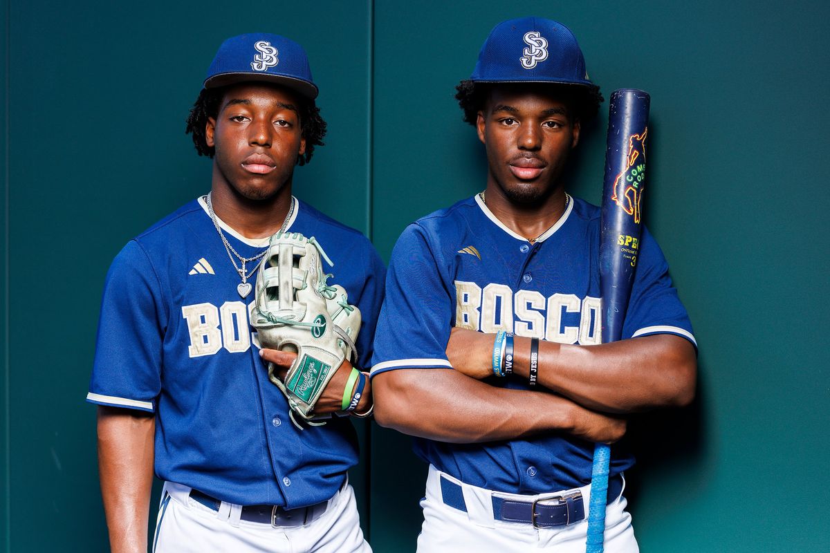 James Clark #22 and Miles Clark #28 of St. John Bosco High School poses for a portrait at St. John Bosco High School on May 21, 2026 in Bellflower, California.