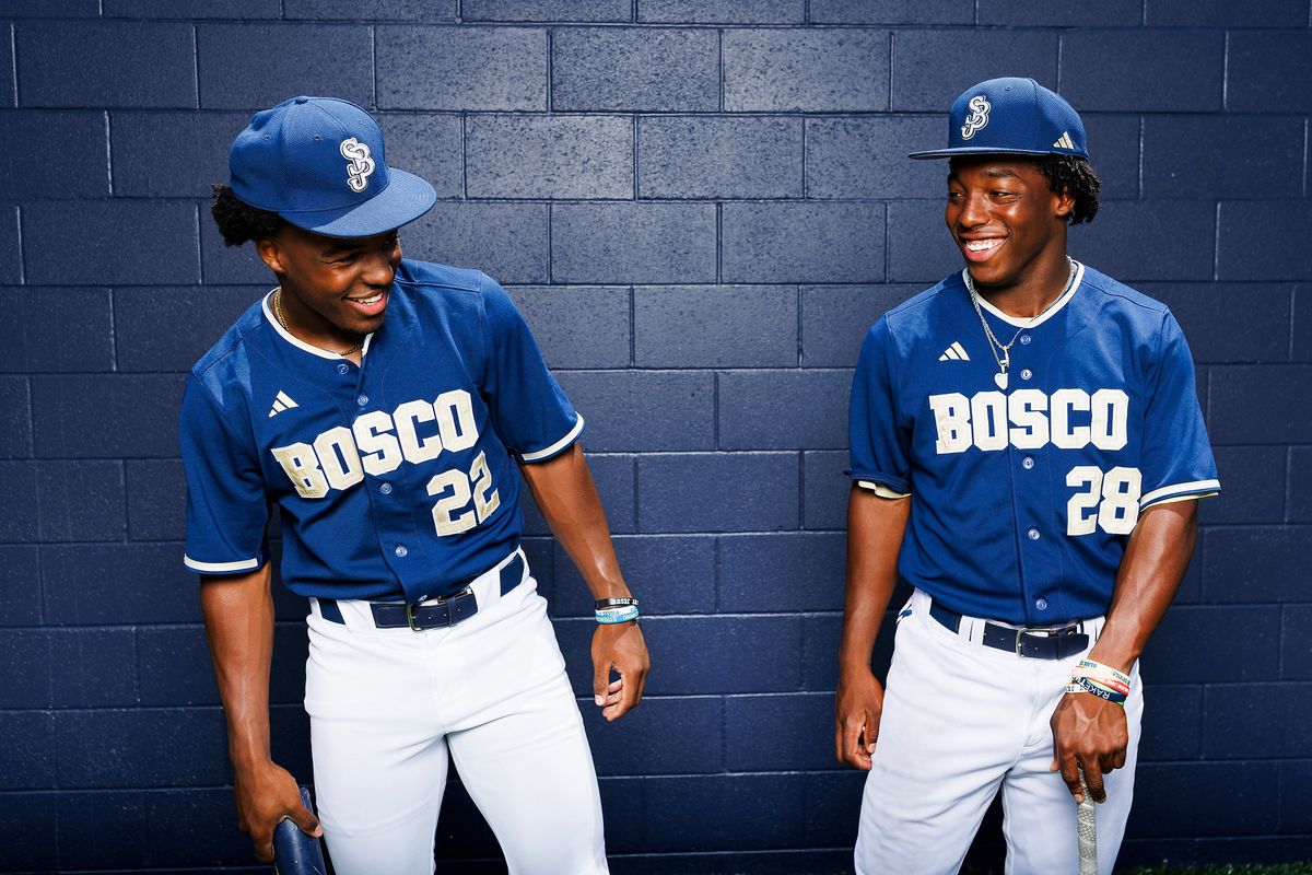 James Clark #22 and Miles Clark #28 of St. John Bosco High School poses for a portrait at St. John Bosco High School on May 21, 2026 in Bellflower, California.