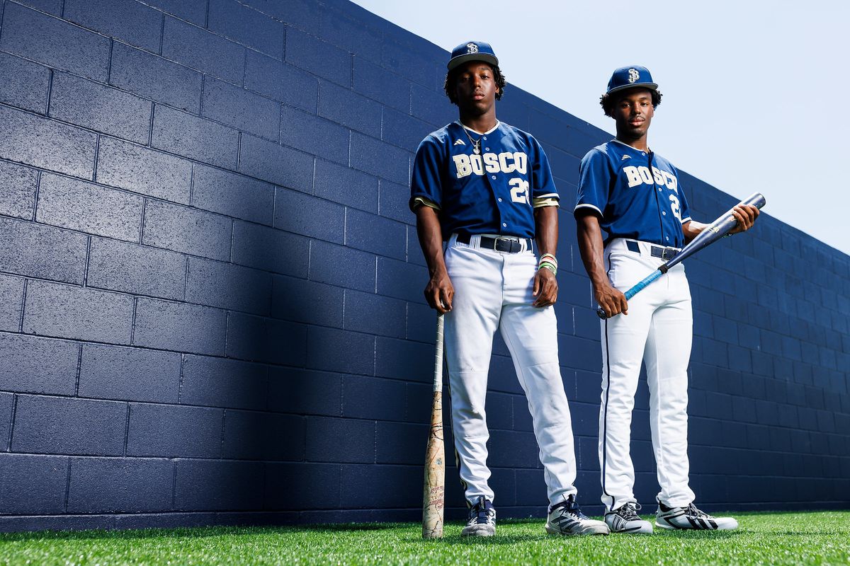 James Clark #22 and Miles Clark #28 of St. John Bosco High School poses for a portrait at St. John Bosco High School on May 21, 2026 in Bellflower, California.