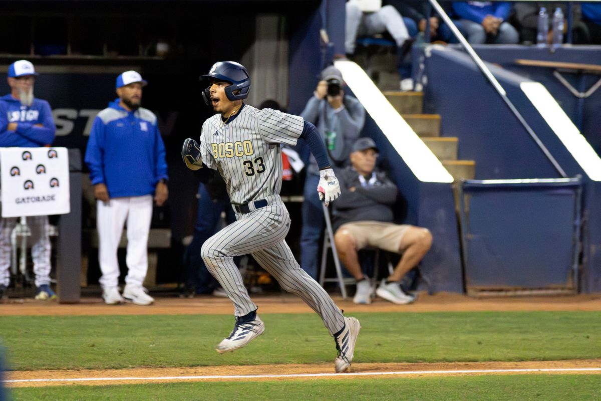 St. John Bosco High School Infielder Moises Razo #33 runs home to score during the CIF Championship game at Goodwin field on May 29, 2026 in Fullerton, California. St. John Bosco High School Infielder Moises Razo #33 runs home to score during the CIF Championship game at Goodwin field on May 29, 2026 in Fullerton, California.