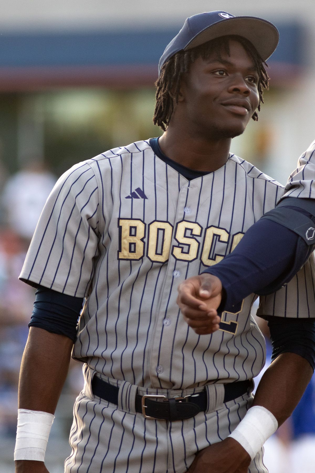 St. John Bosco High School Shortstop Jaden Jackson smiles during pregame before the CIF Championship game at Goodwin field on May 29, 2026 in Fullerton, California. St. John Bosco High School Shortstop Jaden Jackson smiles during pregame before the CIF Championship game at Goodwin field on May 29, 2026 in Fullerton, California.