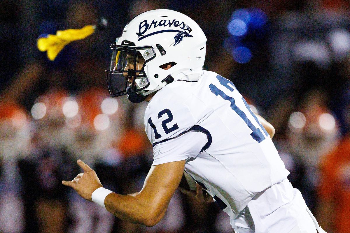 Koa Malau'ulu #12 of St. John Bosco High School runs with the ball as a flag was thrown during the game against Bishop Gorman High School at Fertitta Field on August 21, 2026 in Las Vegas, Nevada. Koa Malau'ulu #12 of St. John Bosco High School runs with the ball as a flag was thrown during the game against Bishop Gorman High School at Fertitta Field on August 21, 2026 in Las Vegas, Nevada.