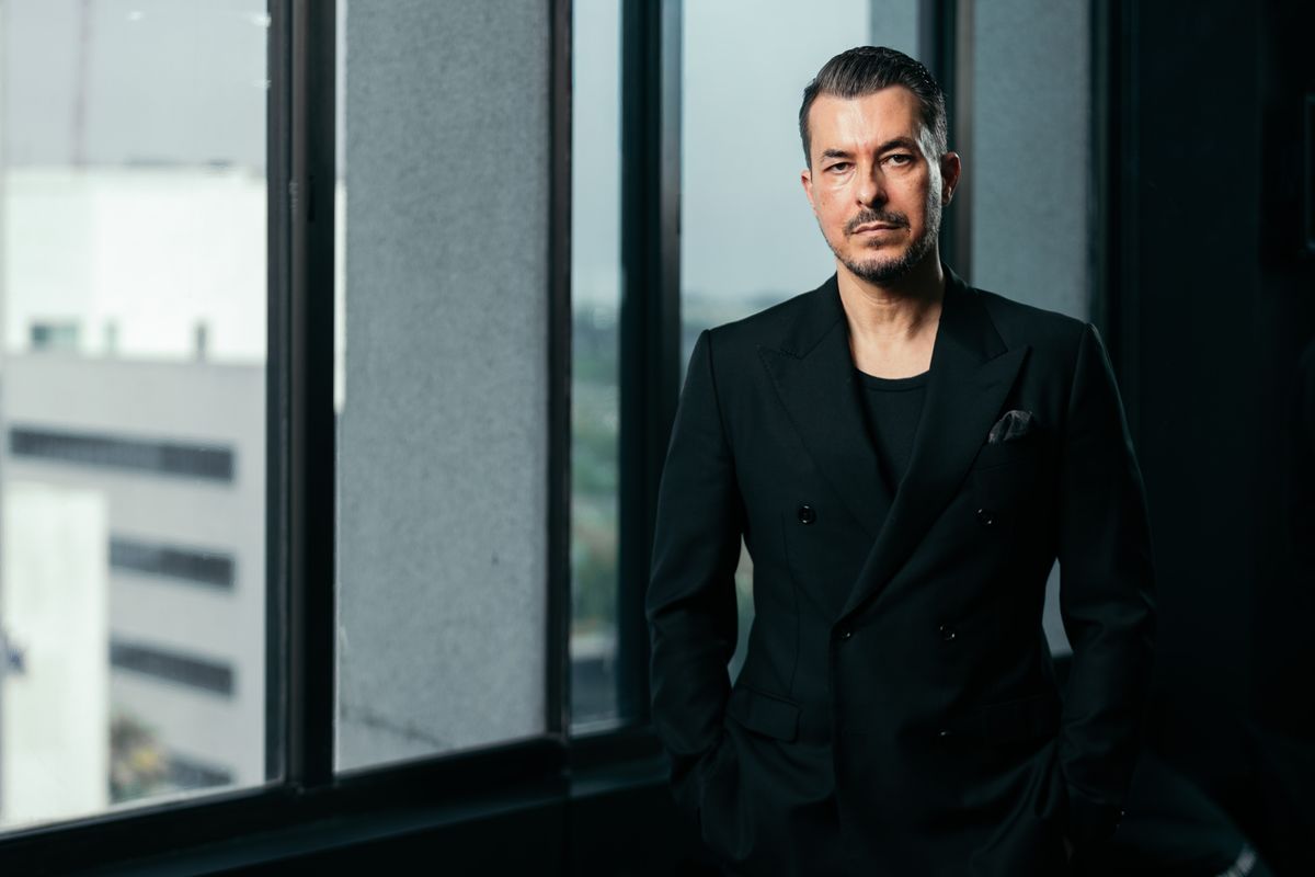 Jason Arasheben poses for a portrait overlooking Beverly Hills. Jason Arasheben poses for a portrait overlooking Beverly Hills.