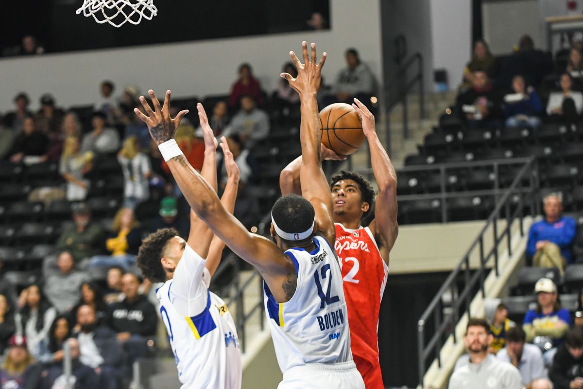 San Diego Clippers  Cam Christie (12) shoots over Santa Cruz center Marques Bolden (12)during an G-League basketball  game against   Santa Cruz Saturday December 13, 2025 in, California.