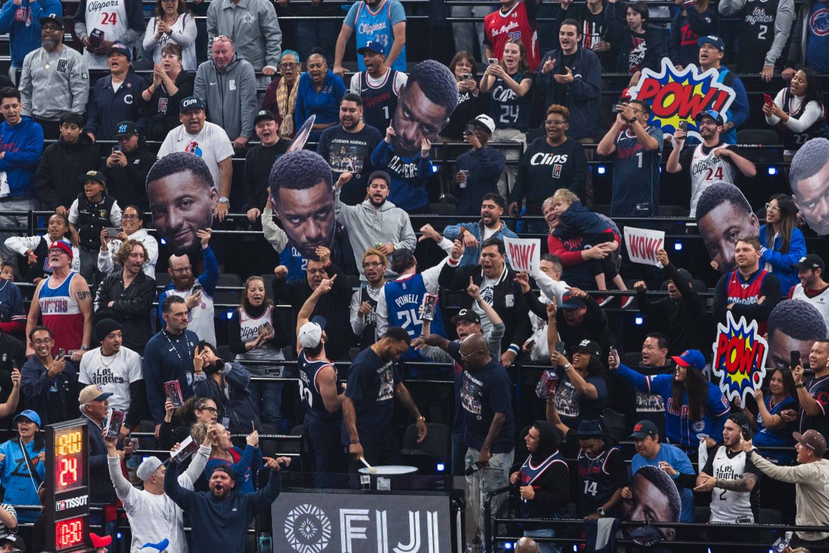 LA Clippers Guard Normal Powell (24) joins the Clippers fan base for pregame at an NBA basketball game against the Orlando Magic, Wednesday November 20th, 2024 in Inglewood, California. 