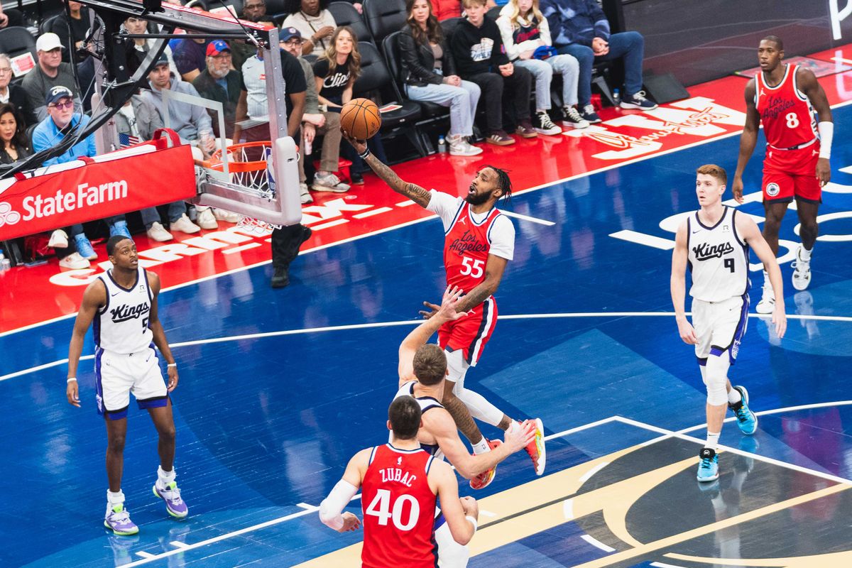 LA Clippers forward Derrick Jones Jr. (55) taking an acrobating lay-up during an NBA basketball game against the Sacramento Kings, Friday November 22th, 2024 in Inglewood, California. LA Clippers forward Derrick Jones Jr. (55) taking an acrobating lay-up during an NBA basketball game against the Sacramento Kings, Friday November 22th, 2024 in Inglewood, California.