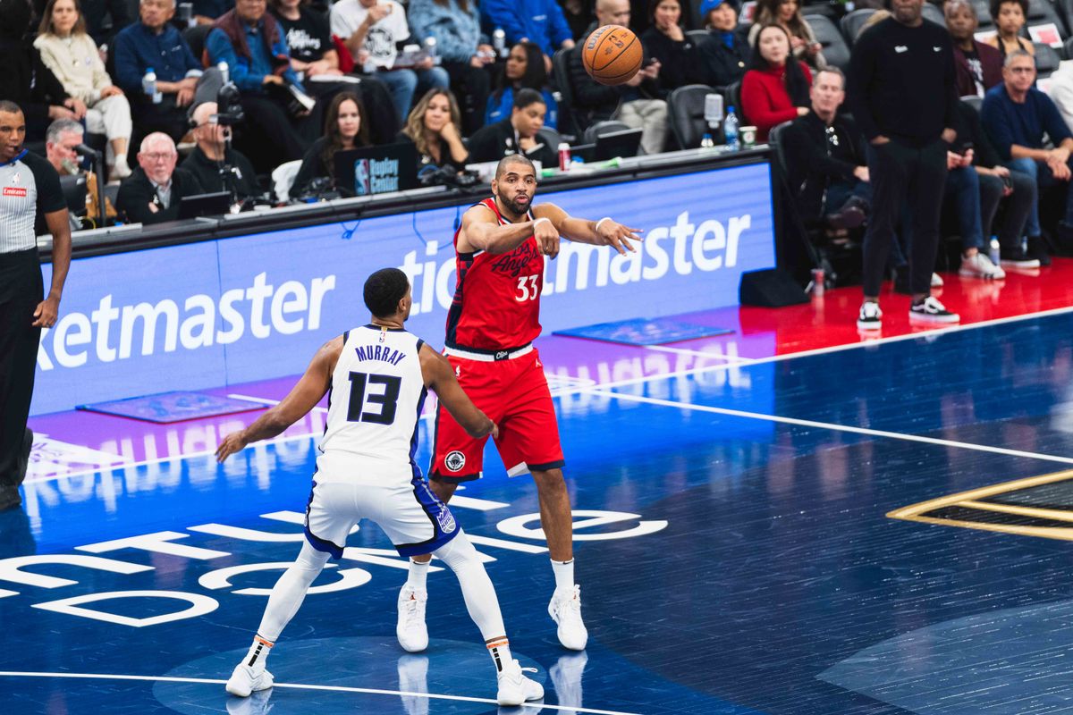 LA Clippers forward Nicolas Batume (33) passes it to the open man during an NBA basketball game against the Sacramento Kings, Friday November 22th, 2024 in Inglewood, California. LA Clippers forward Nicolas Batume (33) passes it to the open man during an NBA basketball game against the Sacramento Kings, Friday November 22th, 2024 in Inglewood, California.