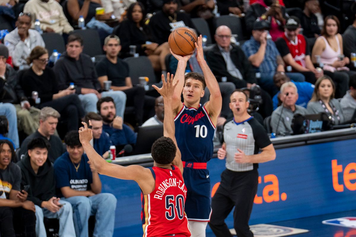 Los Angeles Clippers guard Bogdon Bogdonovic (10) shoots a three-pointer during an NBA basketball game against the New Orleans Pelicans, Wednesday April 2nd, 2025 in Inglewood, California. Los Angeles Clippers guard Bogdon Bogdonovic (10) shoots a three-pointer during an NBA basketball game against the New Orleans Pelicans, Wednesday April 2nd, 2025 in Inglewood, California.