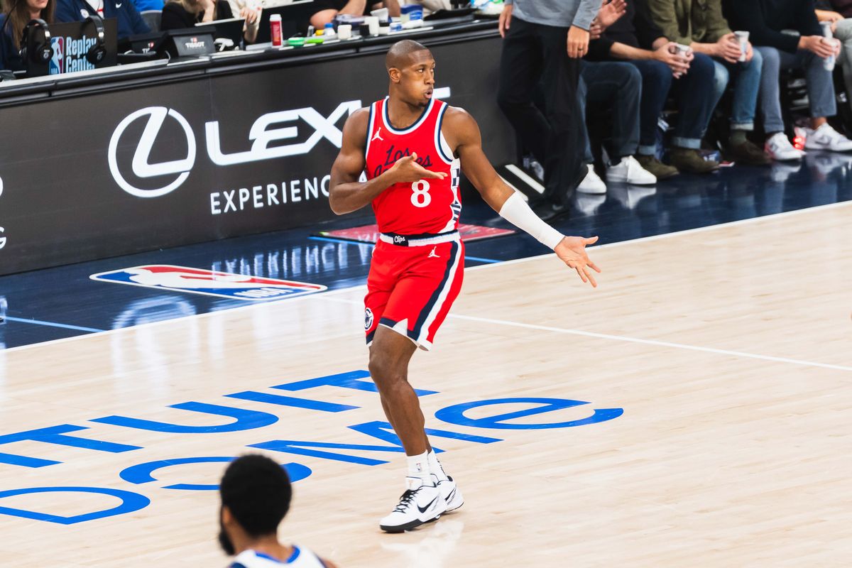 Los Angeles Clippers guard Kris Dunn (8) celebrates a made three pointer during an NBA basketball game against the Dallas Mavericks, Friday April 4th, 2025 in Inglewood, California. 