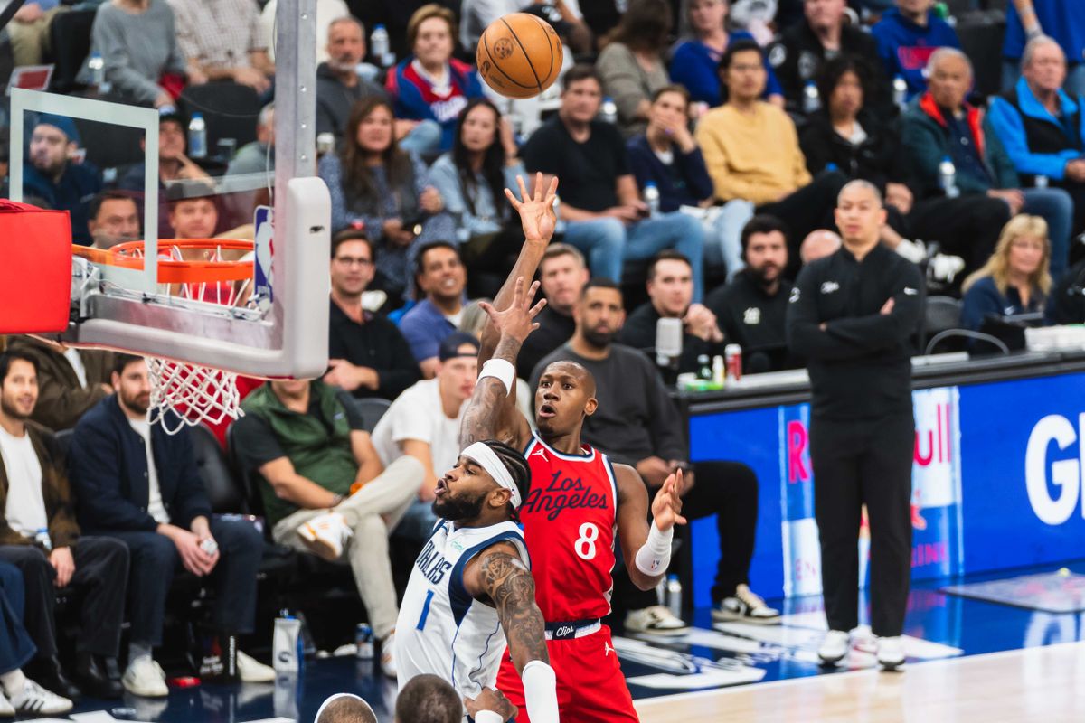 Los Angeles Clippers guard Kris Dunn (8) scores in the paint during an NBA basketball game against the Dallas Mavericks, Friday April 4th, 2025 in Inglewood, California. 