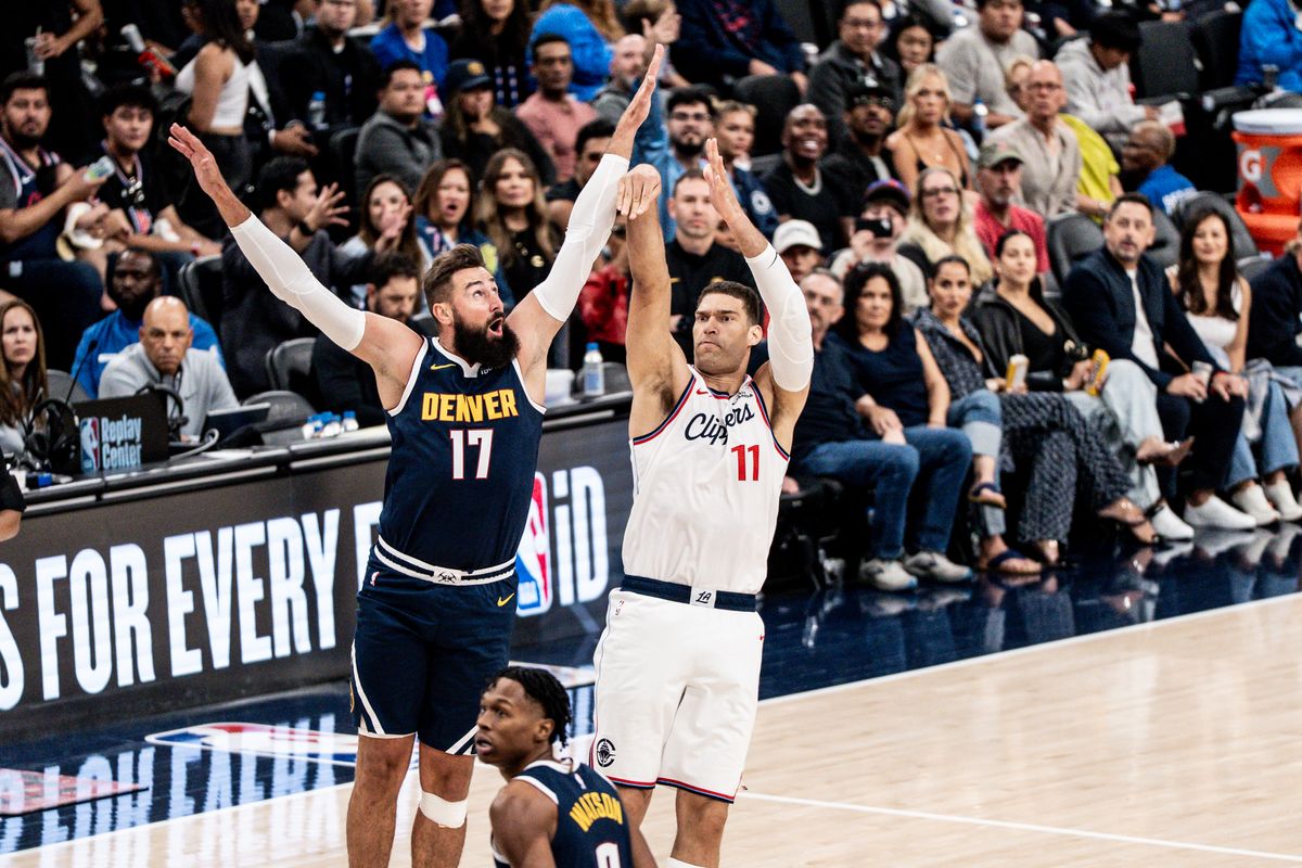Los Angeles Clippers C Brook Lopez (11) shoots over the defender during an NBA pre-season basketball game against the Denver Nuggets, Sunday October 12th, 2025 in Inglewood, California. 