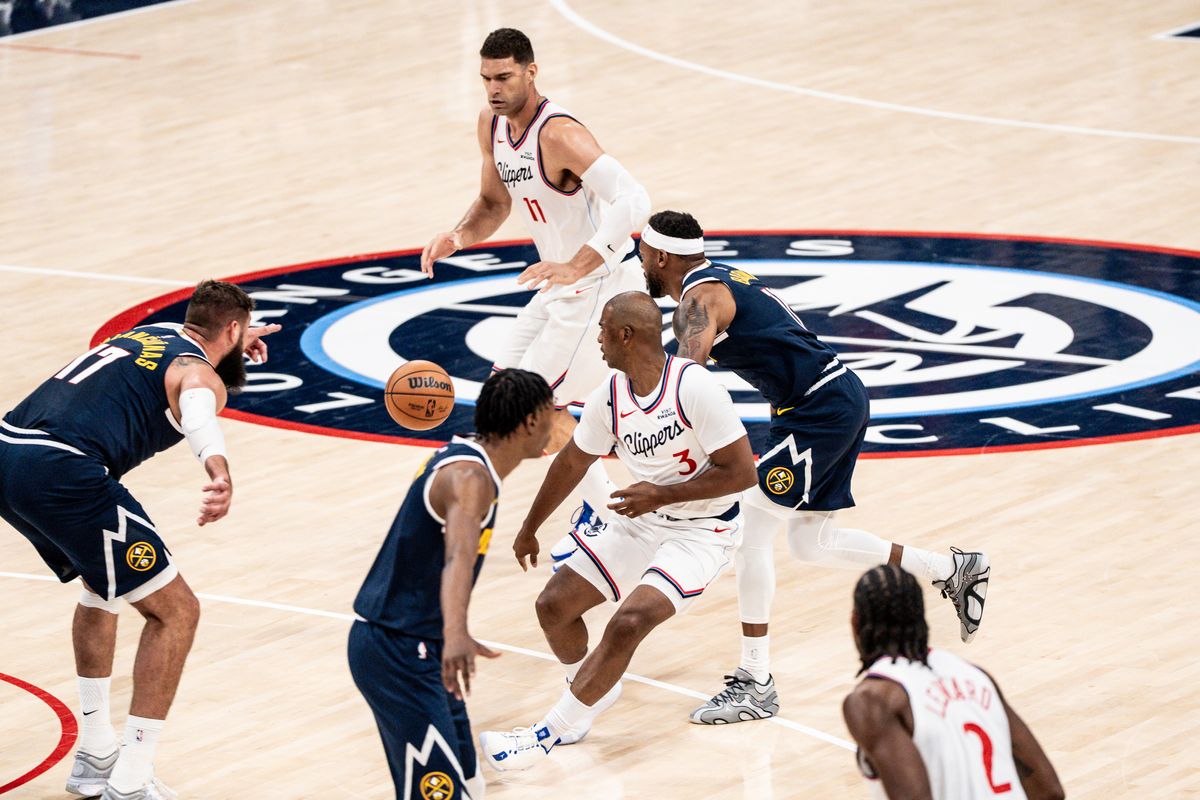 Los Angeles Clippers PG Chris Paul (3) sets up a pick and pop with his teammate Brook Lopez (11) during an NBA pre-season basketball game against the Denver Nuggets, Sunday October 12th, 2025 in Inglewood, California. 