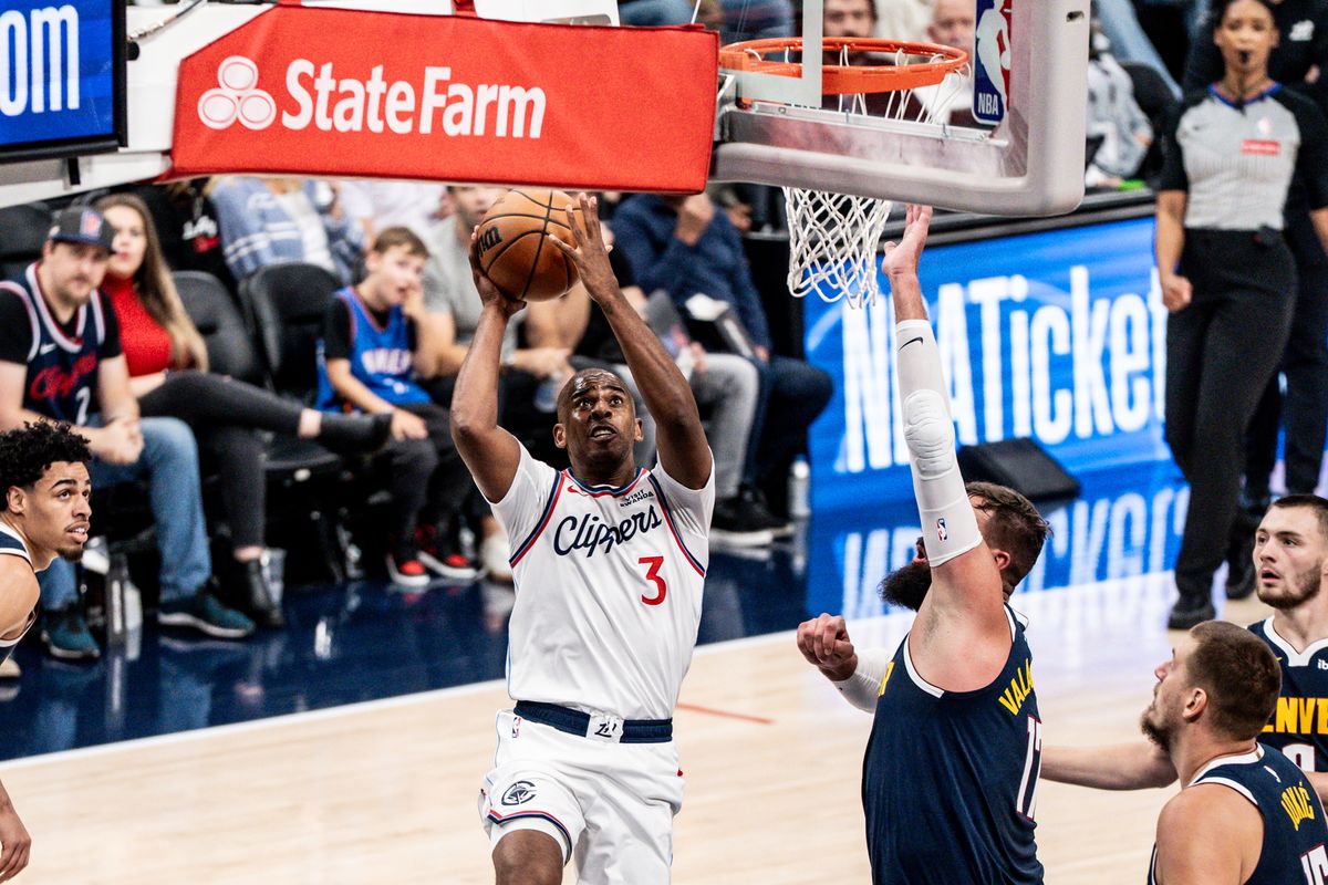 Los Angeles Clippers PG Chris Paul (3) attacks the rim and scores a layup during an NBA pre-season basketball game against the Denver Nuggets, Sunday October 12th, 2025 in Inglewood, California. 