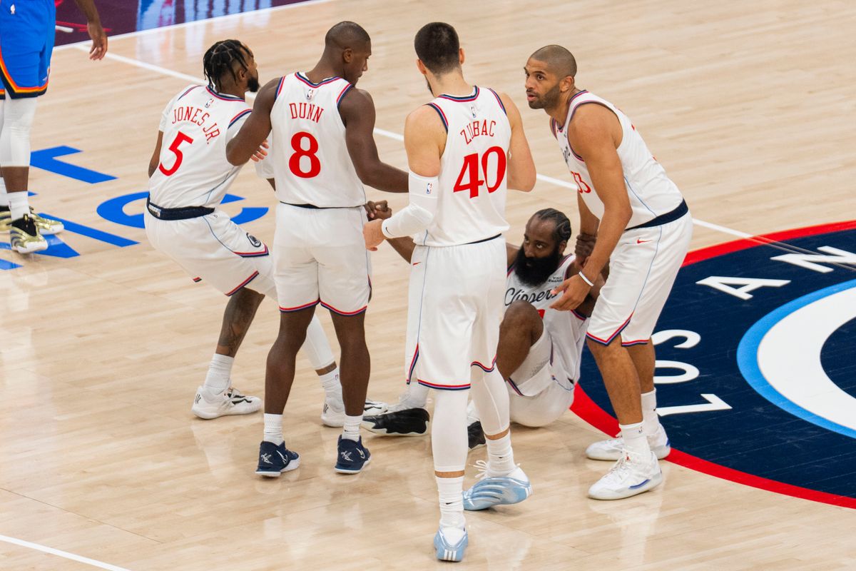 Los Angeles Clippers helping up guard James Harden (1) during an NBA basketball game against the Oklahoma City Thunder, Tuesday November 4th, 2025 in Los Angeles, California.