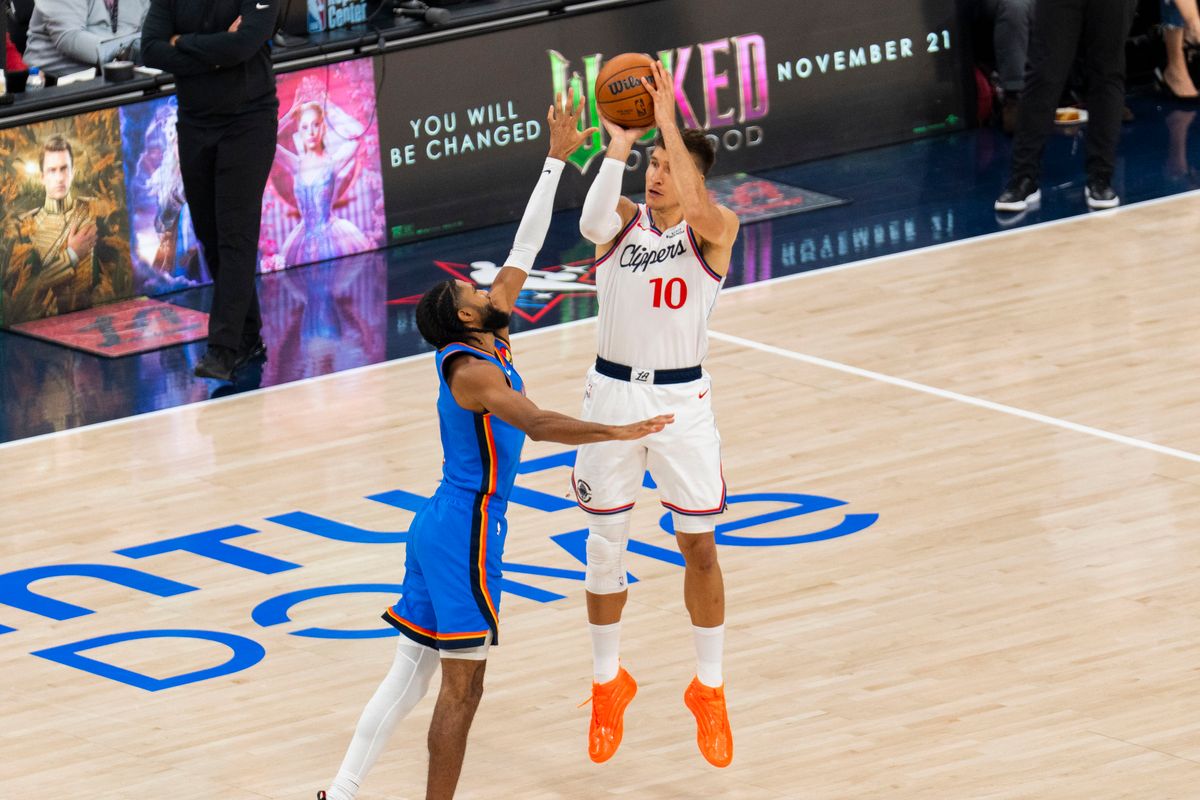 Los Angeles Clippers guard Bogdan Bogdanovic (1) takes a three during an NBA basketball game against the Oklahoma City Thunder, Tuesday November 4th, 2025 in Los Angeles, California.