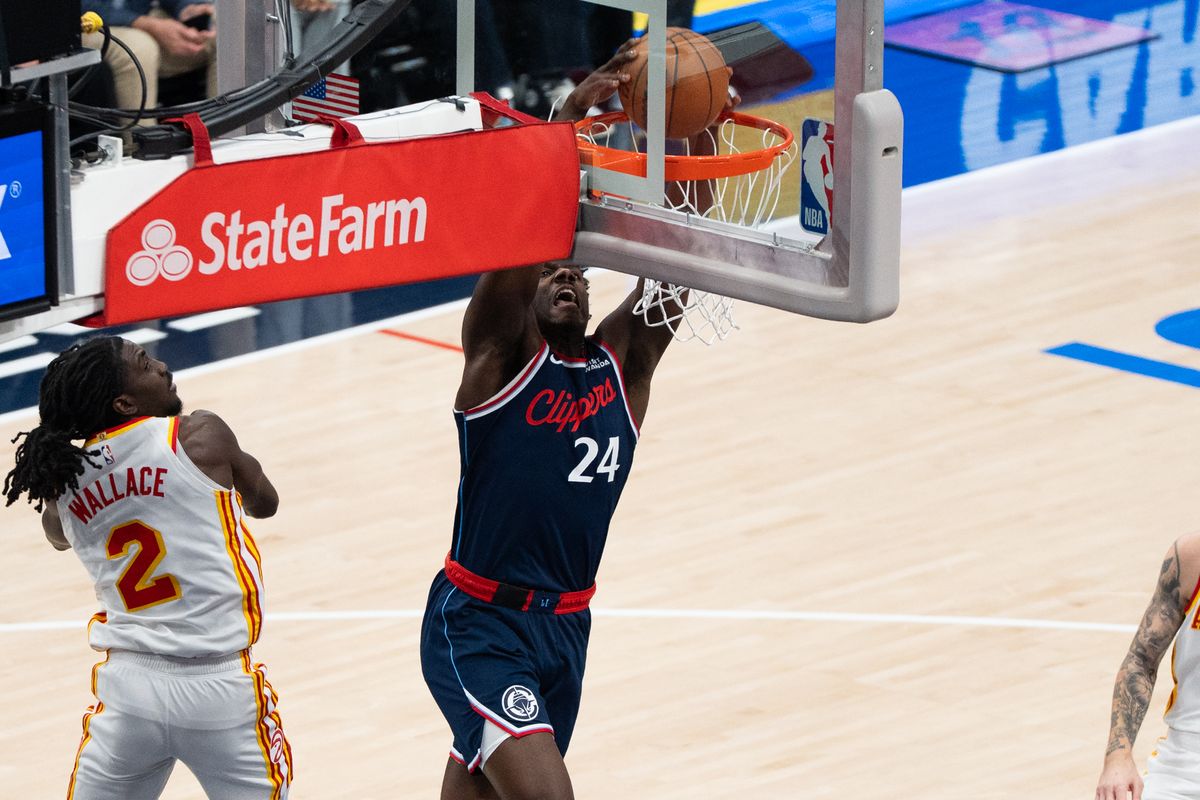 Los Angeles Clippers forward Kobe Brown (24) attacks the rim and slams it in at an NBA basketball game against the Atlanta Hawks, Monday November 10th, 2025 in Inglewood, California. 