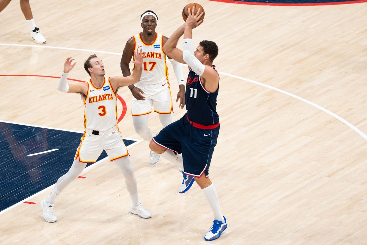 Los Angeles Clippers Center Brook Lopez (11) takes a one foot corner jump shot at an NBA basketball game against the Atlanta Hawks, Monday November 10th, 2025 in Inglewood, California. 