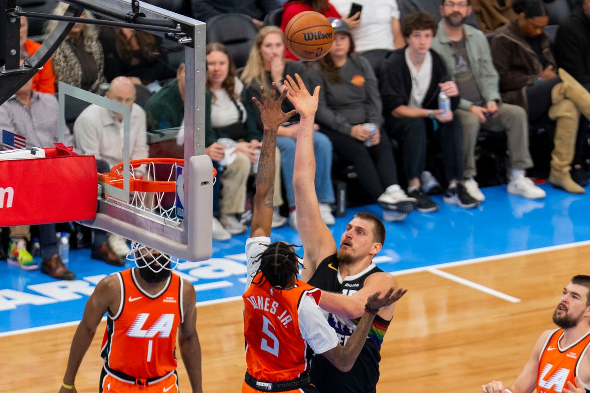 Denver Nuggets center Nikola Jokic (15) shoots a floater during an NBA basketball game against the Los Angeles Clippers, Tuesday November 4th, 2025 in Los Angeles, California. 