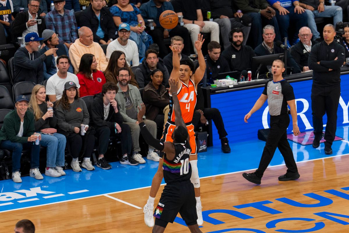 Los Angeles Clippers guard Kobe Sanders (4) takes a three during an NBA basketball game against the Denver Nuggets, Tuesday November 12th, 2025 in Los Angeles, California.
