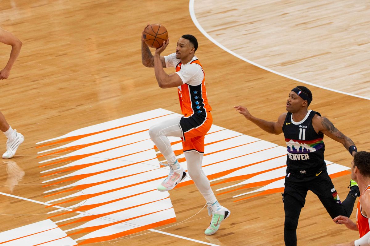 Los Angeles Clippers guard Jordan Miller (22) hits a half court shot during an NBA basketball game against the Denver Nuggets, Tuesday November 12th, 2025 in Los Angeles, California.