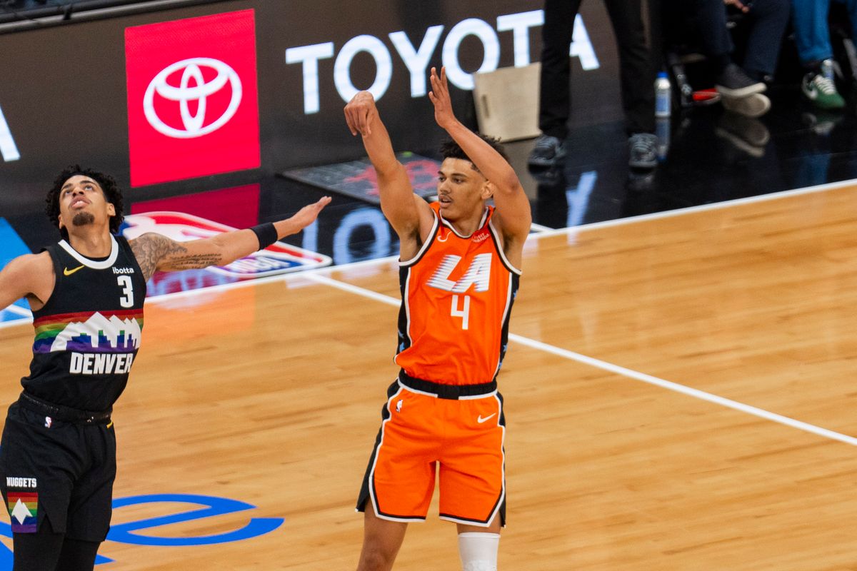 Los Angeles Clippers guard Kobe Sanders (4) takes a three during an NBA basketball game against the Denver Nuggets, Tuesday November 12th, 2025 in Los Angeles, California.