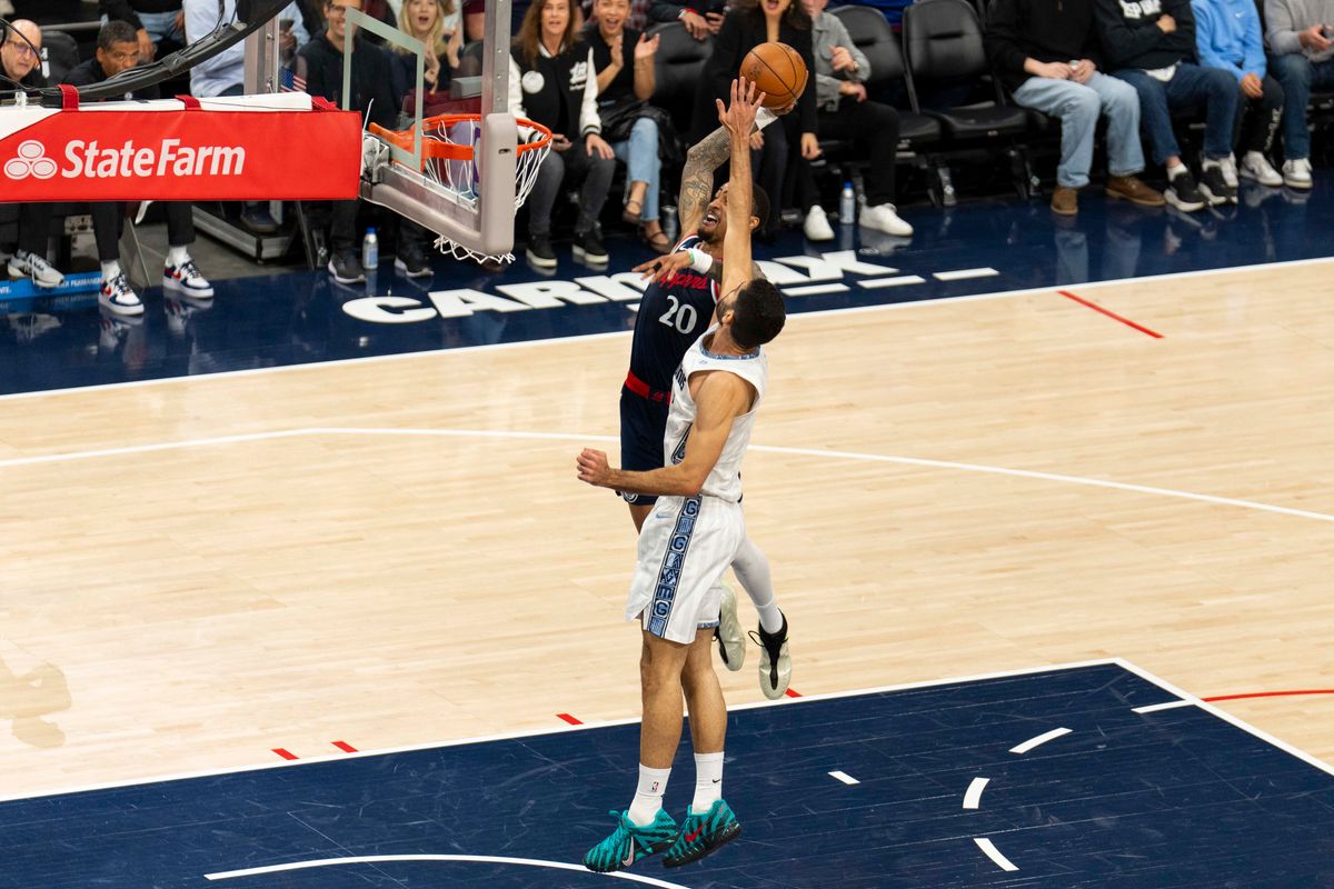 Los Angeles Clippers forward John Collins (20) finishes the fast break dunk during an NBA basketball game against the Memphis Grizzlies, Monday December 15th, 2025 in Los Angeles, California. Los Angeles Clippers forward John Collins (20) finishes the fast break dunk during an NBA basketball game against the Memphis Grizzlies, Monday December 15th, 2025 in Los Angeles, California.