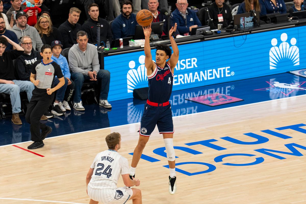 Los Angeles Clippers guard Kobe Sanders (4) makes a three during an NBA basketball game against the Memphis Grizzlies, Monday December 15th, 2025 in Los Angeles, California. Los Angeles Clippers guard Kobe Sanders (4) makes a three during an NBA basketball game against the Memphis Grizzlies, Monday December 15th, 2025 in Los Angeles, California.