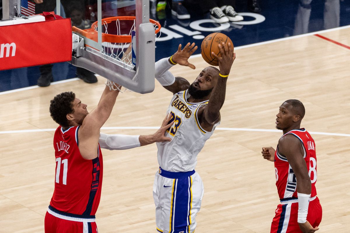 LeBron James #23 of the Los Angeles Lakers drives towards the rim during an NBA basketball game against the LA Clippers, Saturday December 20, 2025 in Inglewood, Calif.