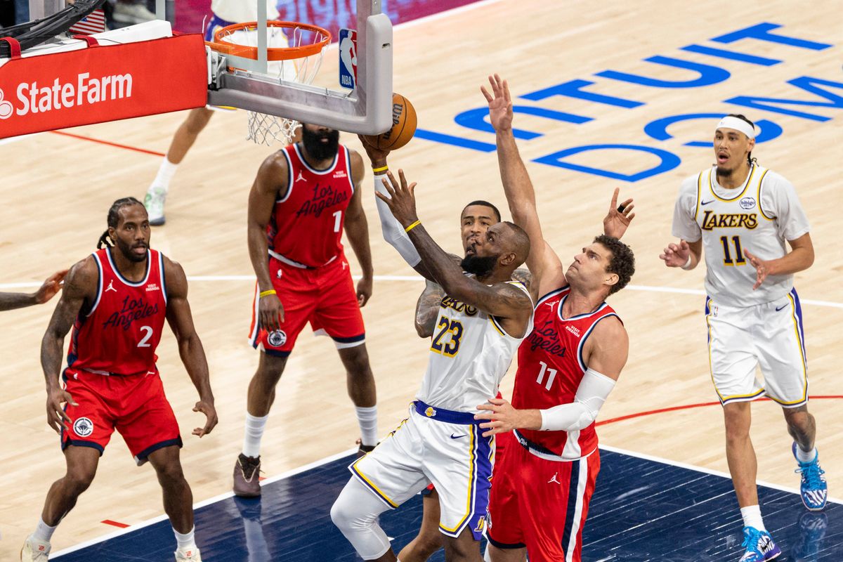 LeBron James #23 of the Los Angeles Lakers lays the ball up during an NBA basketball game against the LA Clippers, Saturday December 20, 2025 in Inglewood, Calif.