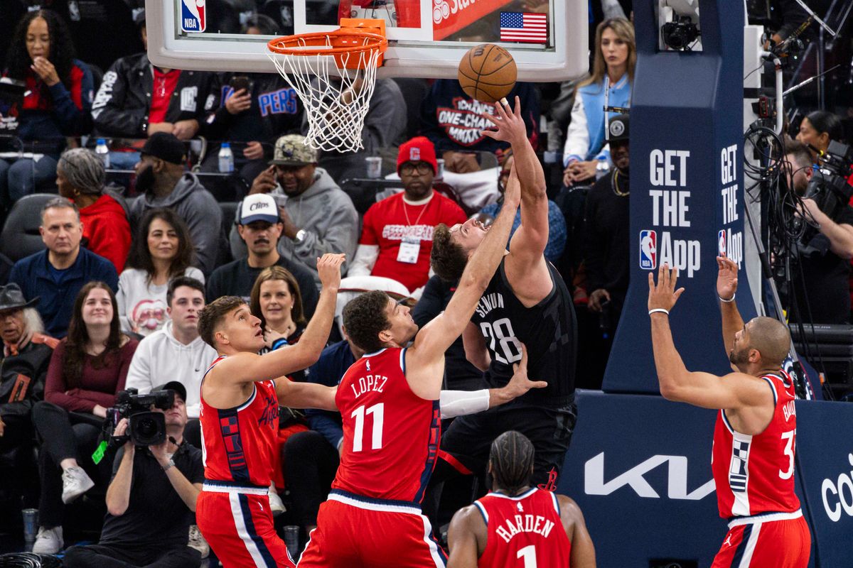 Alperen Sengun #28 of the Houston Rockets lays the ball up during an NBA basketball game against the LA Clippers, Tuesday December 23, 2025 in Inglewood, Calif.
