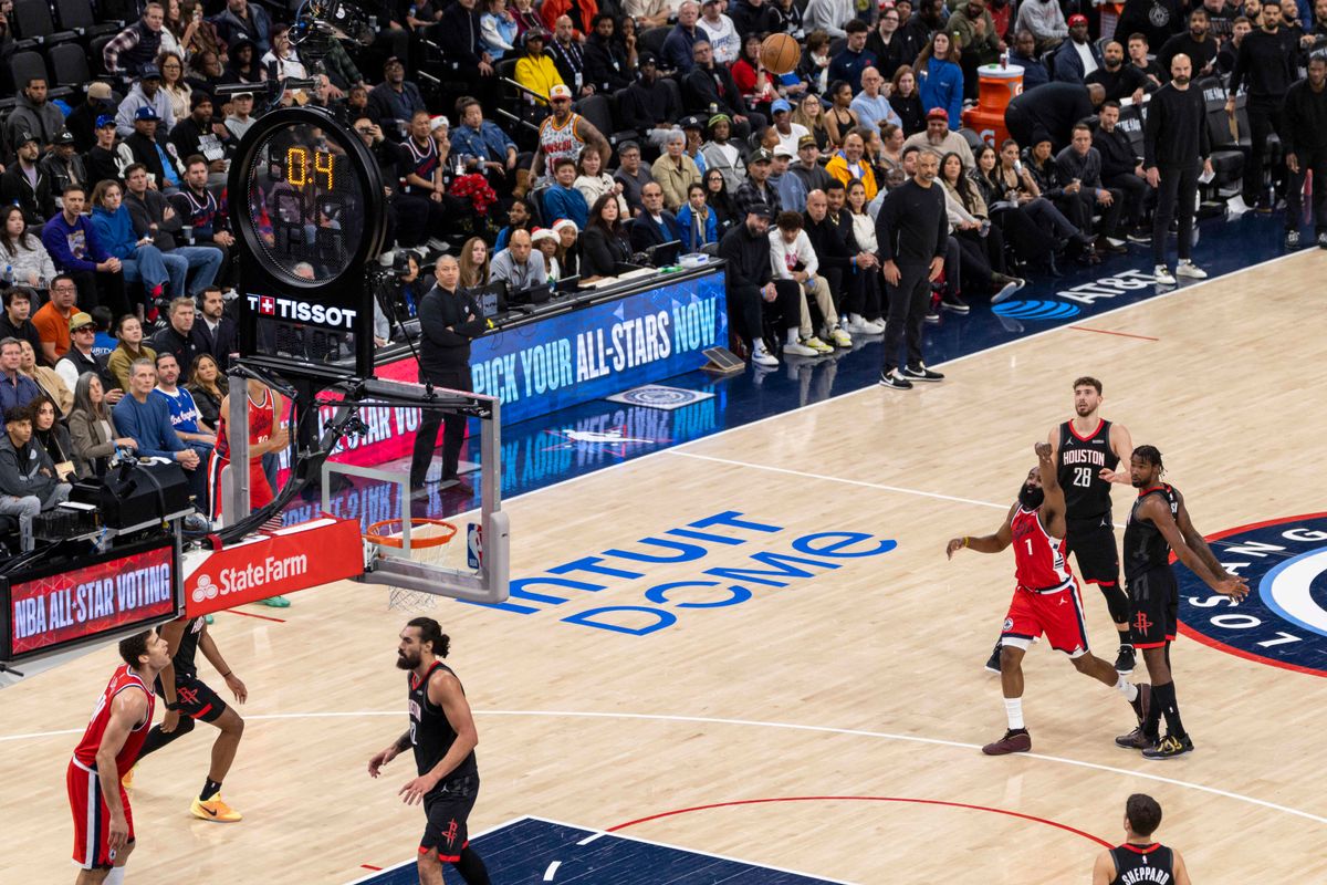 James Harden #1 of the LA Clippers beats the first quarter buzzer with a three point shot during an NBA basketball game against the Houston Rockets, Tuesday December 23, 2025 in Inglewood, Calif.
