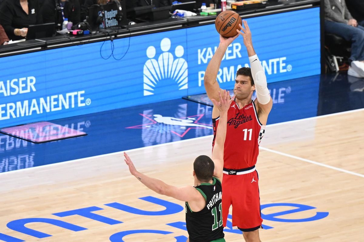 Los Angeles Clippers center Brook Lopez, #11 shoots a three-pointer during an NBA basketball game against the Boston Celtics, Saturday January 3, 2026 at Intuit Dome in Inglewood, Calif.