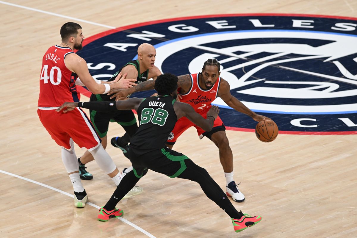 Los Angeles Clippers small forward Kawhi Leonard, #2 gets double teamed during an NBA basketball game against the Boston Celtics, Saturday January 3, 2026 at Intuit Dome in Inglewood, Calif.