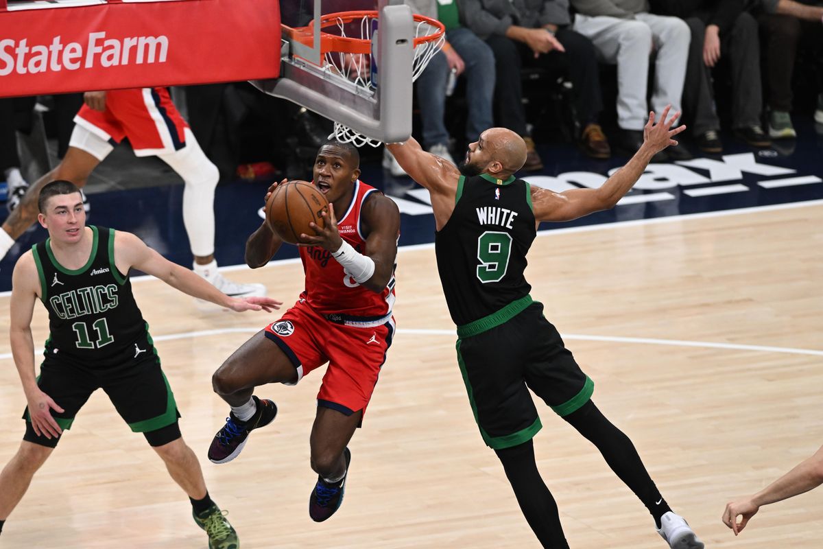 Los Angeles Clippers Kris Dunn, #8, goes up and under the defense during an NBA basketball game against the Boston Celtics, Saturday January 3, 2026 at Intuit Dome in Inglewood, Calif.