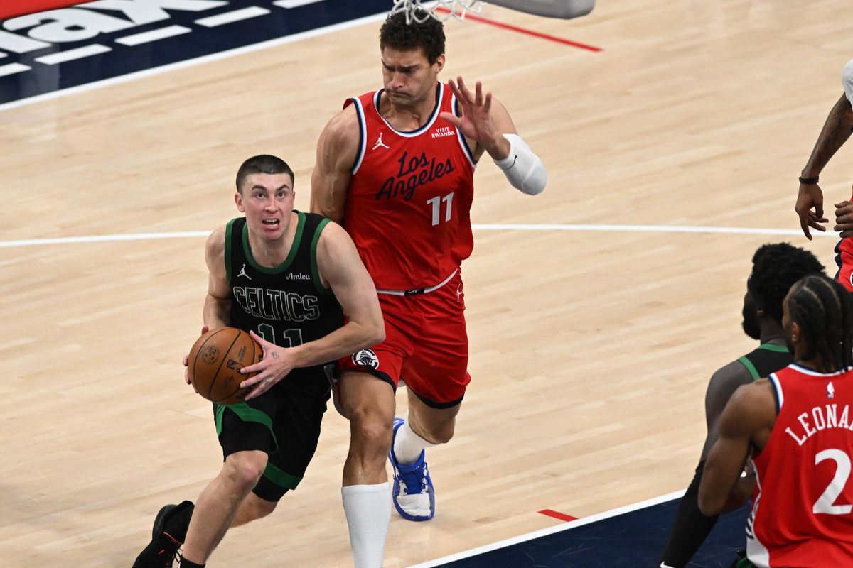 Boston Celitcs guard Payton Pritchard, #11, makes a move under the basket during an NBA basketball game against the Los Angeles Clippers, Saturday January 3, 2026 at Intuit Dome in Inglewood, Calif.