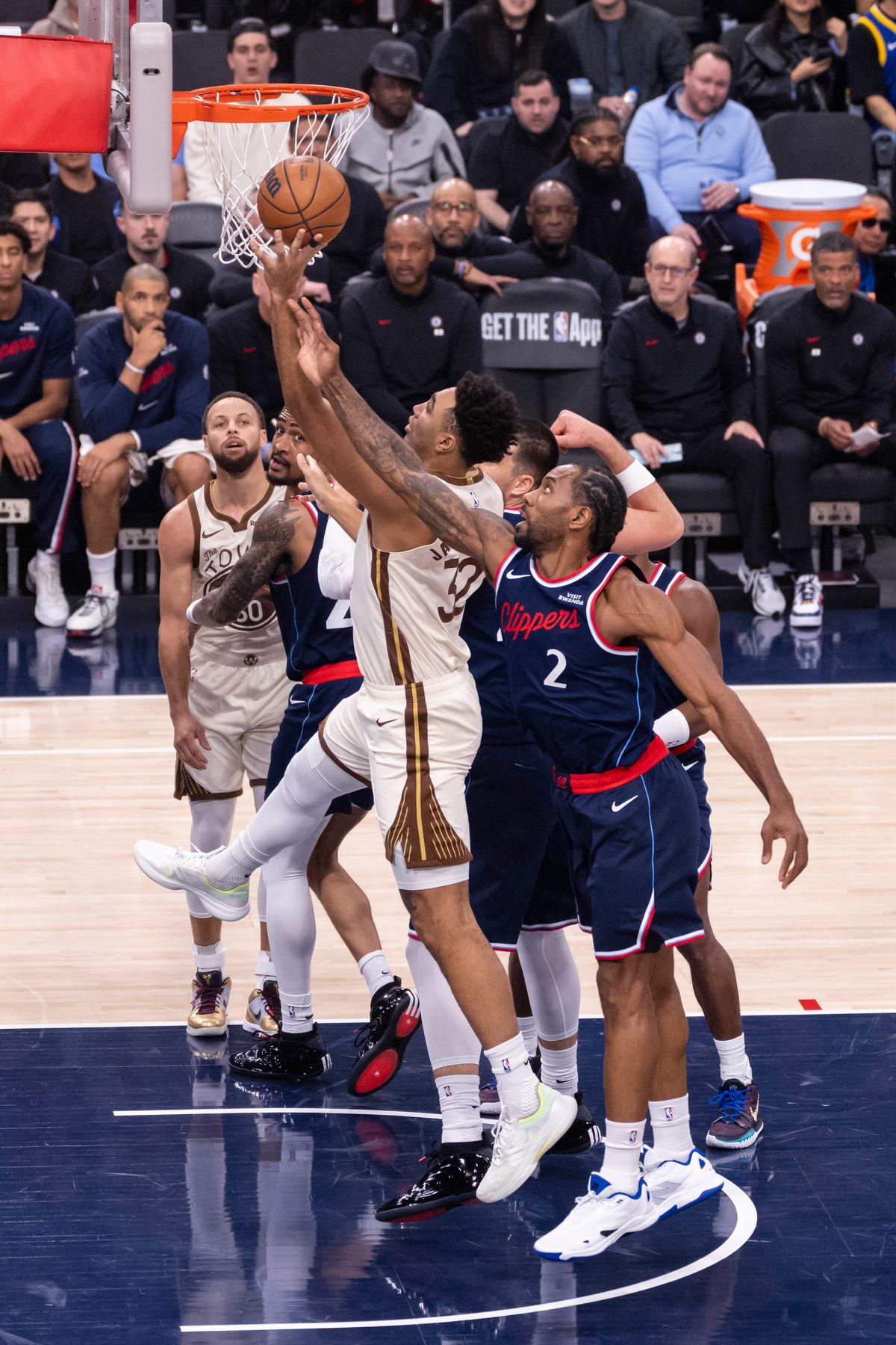 Trayce Jackson-Davis #32 of the Golden State Warriors lays the ball up during an NBA basketball game against the LA Clippers, Monday January 5, 2026 in Inglewood, Calif.