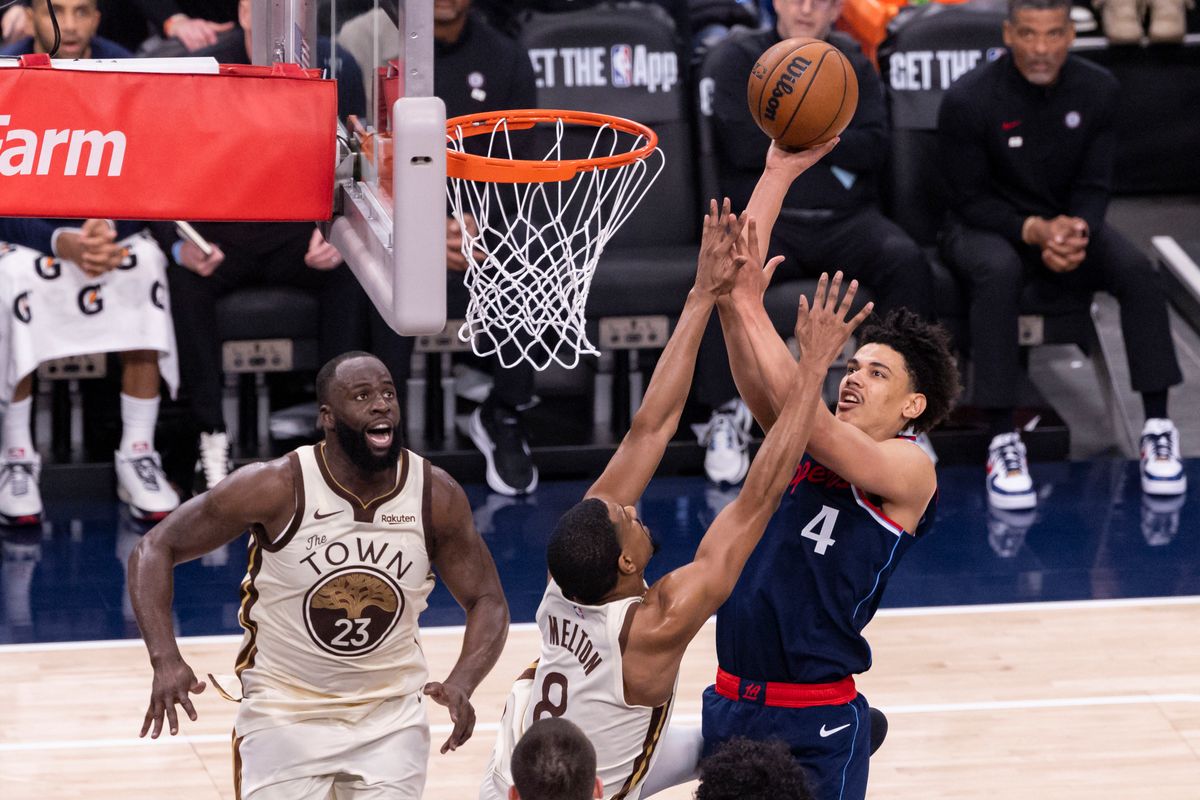 Kobe Sanders #4 of the LA Clippers shoots the ball during an NBA basketball game against the Golden State Warriors, Monday January 5, 2026 in Inglewood, Calif.