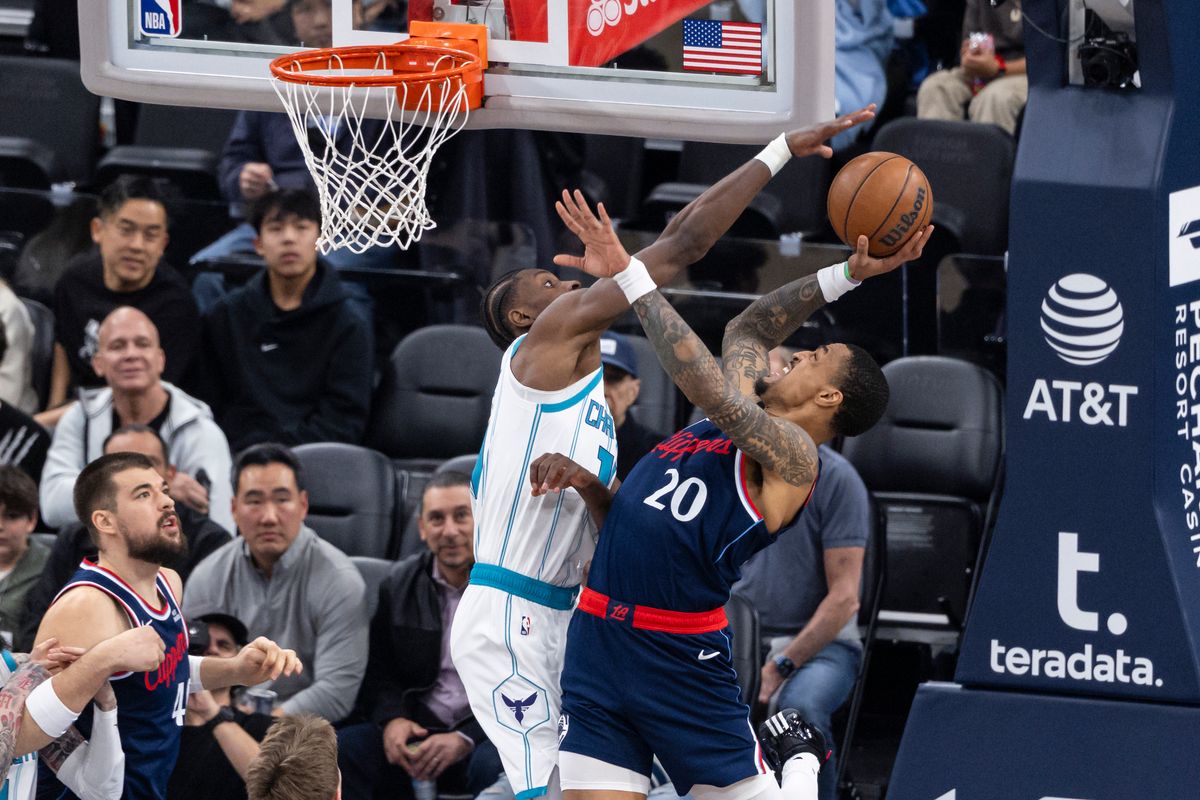 John Collins #20 of the LA Clippers shoots the ball during an NBA basketball game against the Charlotte Hornets, Monday January 12, 2026 in Inglewood, Calif.