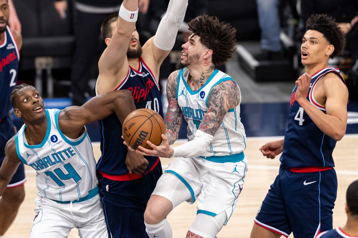 LaMelo Ball #1 of the Charlotte Hornets drives to the basket during an NBA basketball game against the LA Clippers, Monday January 12, 2026 in Inglewood, Calif.