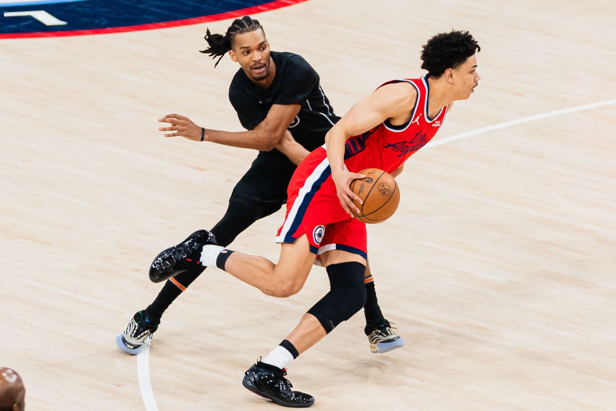 Los Angeles Clippers guard Kobe Sanders (4) gets past their opponent during an NBA basketball game against the Brooklyn Nets, Sunday January 25th, 2026 in Inglewood, California. 