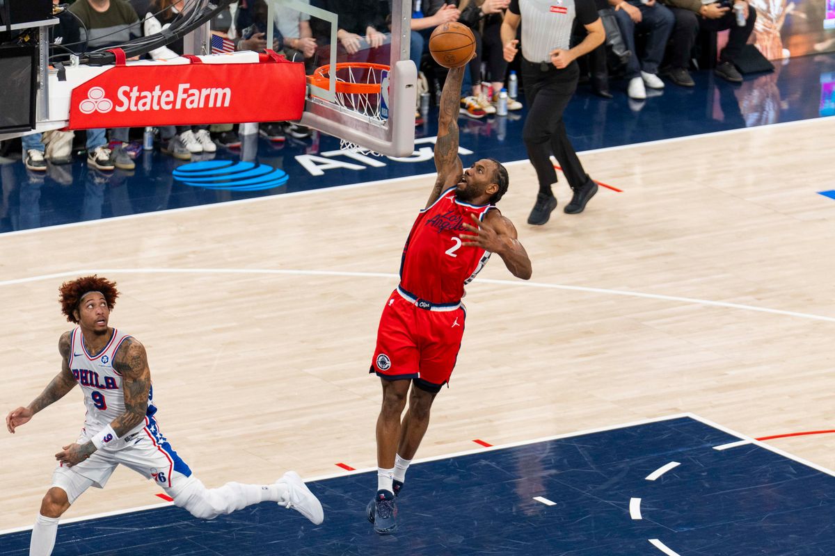 Los Angeles Clippers forward Kawhi Leonard (2) finishes the fast break dunk during an NBA basketball game against the Philadelphia 76ers, Monday February 2nd, 2026 in Los Angeles, California.