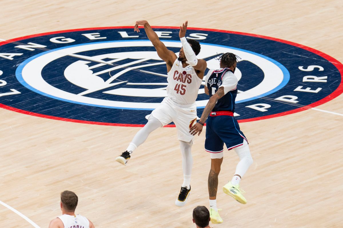 Cleveland Cavaliers guard Donovan Mitchell (45) hits a deep three pointer at the end of the half during an NBA basketball game against the Los Angeles Clippers, Wednesday February 4th, 2026 in Los Angeles, California. 