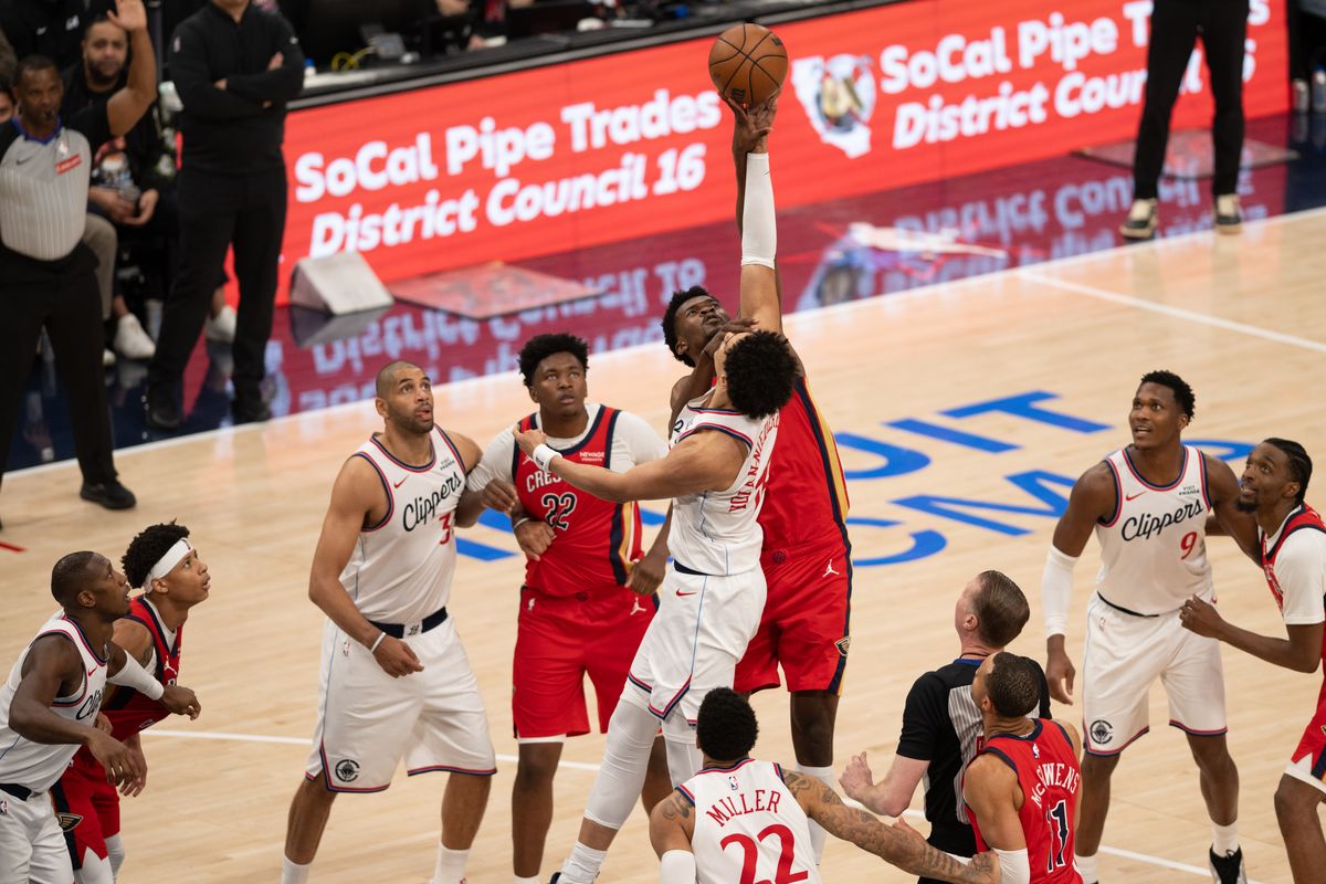 LA Clippers center  Yanic Konan Niederhäuser (14) battles for possession after a jump ball during an NBA game between the New Orleans Pelicans and the LA Clippers on Sunday, March 1, 2026 at Intuit Dome in Inglewood Calif