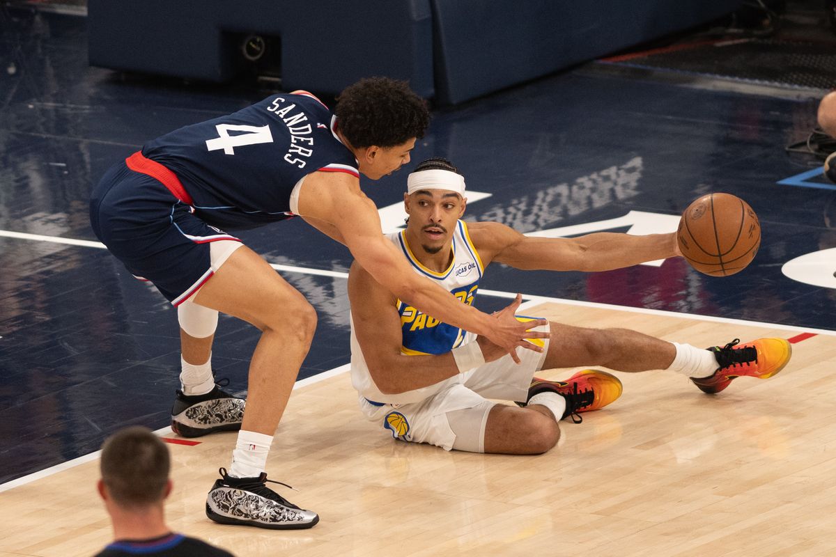 Indiana Pacers guard Andrew Nembhard (2) passes the ball after slipping on the floor during an NBA game between the Indiana Pacers and the LA Clippers on Wednesday, March 4, 2026 at Intuit Dome in Inglewood Calif