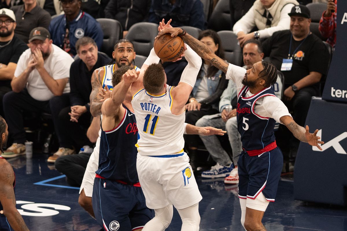 LA Clippers guard Derrick Jones Jr (5) blocks a shot by Pacers center Micah Potter (11) during an NBA game between the Indiana Pacers and the LA Clippers on Wednesday, March 4, 2026 at Intuit Dome in Inglewood Calif