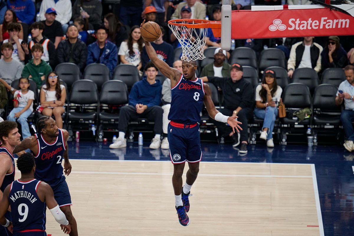 The Los Angeles Clippers guard Kris Dunn (8) gets a rebound during an NBA game against The New York Knicks, March 9th, 2026 in Inglewood, California.