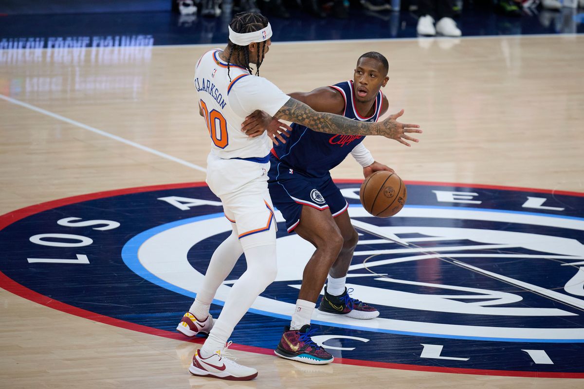 The Los Angeles Clippers guard Kris Dunn (8) controls the ball during an NBA game against The New York Knicks, March 9th, 2026 in Inglewood, California.