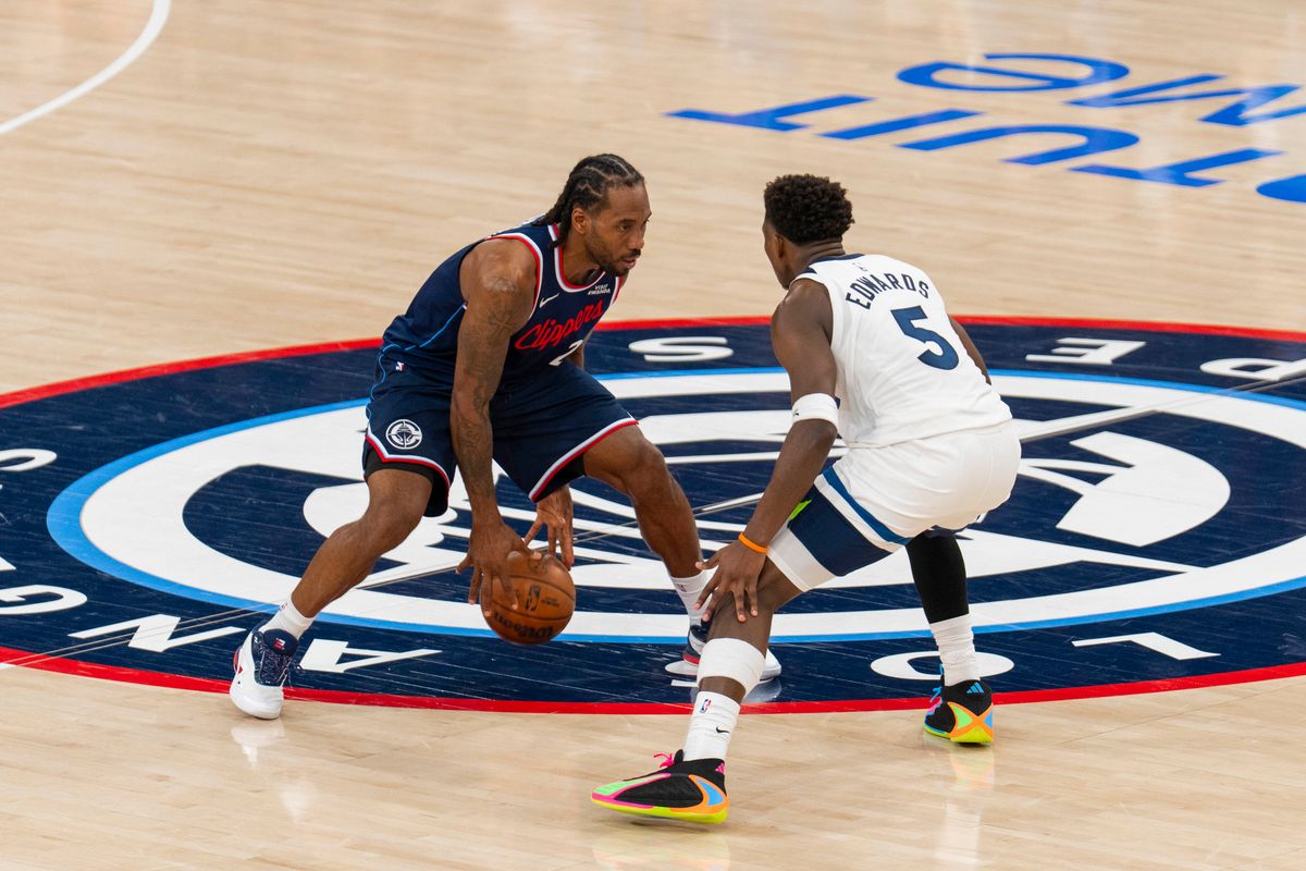 Los Angeles Clippers forward Kawhi Leonard (2) takes on Anthony Edwards (5) one on one during an NBA basketball game against the Minnesota Timberwolves, Wednesday March 11th, 2026 in Los Angeles, California.