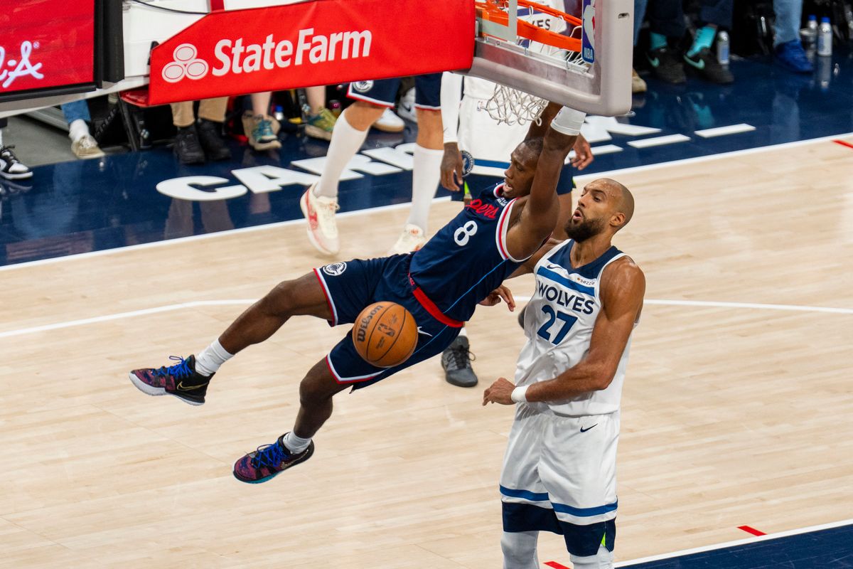 Los Angeles Clippers guard Kris Dunn (8) finishes the fast break dunk during an NBA basketball game against the Minnesota Timberwolves, Wednesday March 11th, 2026 in Los Angeles, California.